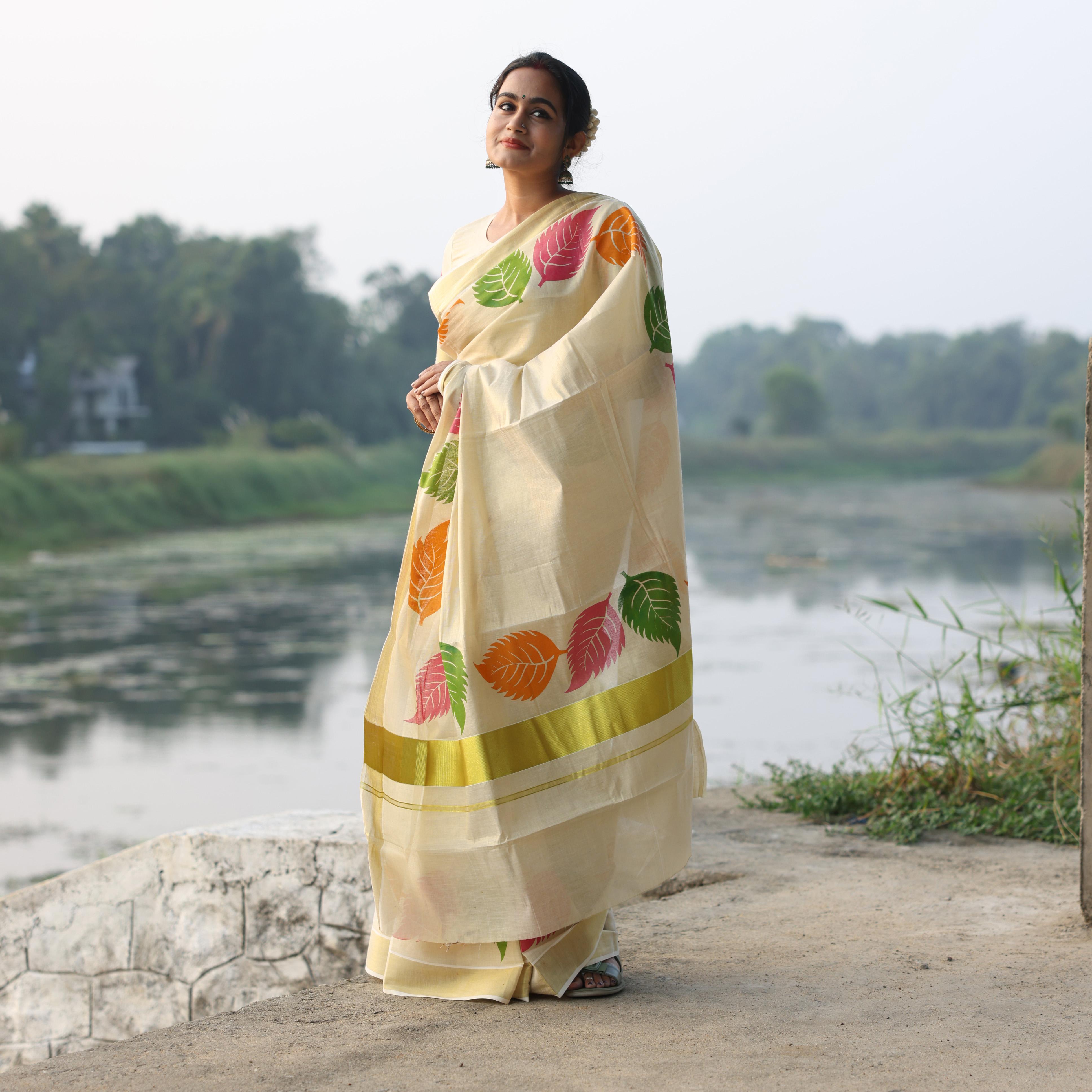 Multi color leaf golden tissue saree